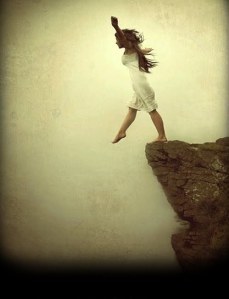 girl-stepping-off-cliff
