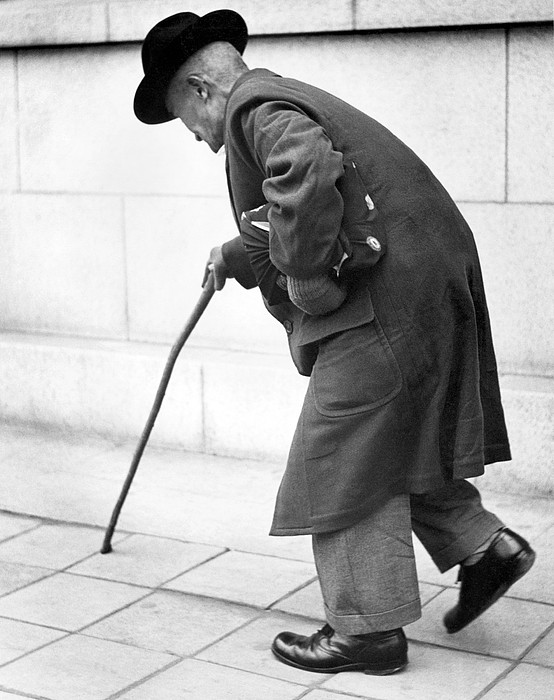old-man-walking-with-a-cane-underwood-archives