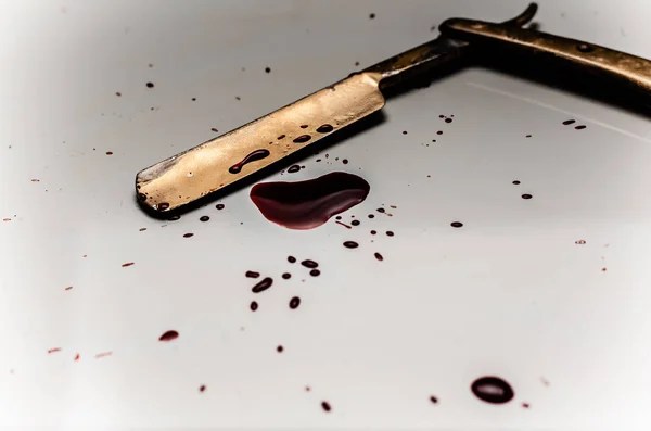Bloodied Razor Another of Life’s Cliches – subtext